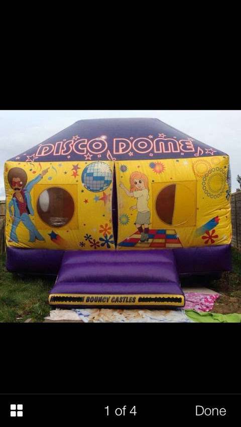 Bouncing around castle hire fully insured cheap rates! photo